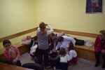 Spotkanie scholki z Leą i ks. Krzysztofem